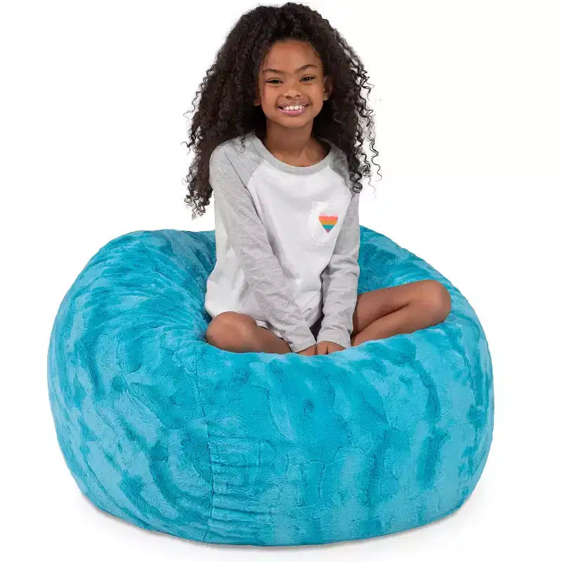 Pouf en fausse fourrure – Plusieurs coloris – 1 place