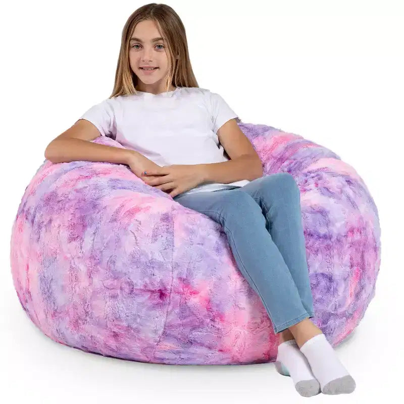 Pouf en fausse fourrure – Plusieurs coloris – 1 place
