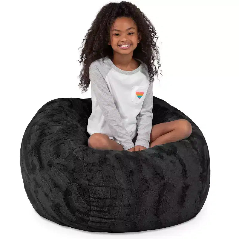 Pouf en fausse fourrure – Plusieurs coloris – 1 place