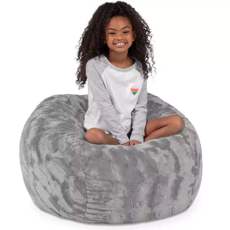 Pouf en fausse fourrure – Plusieurs coloris – 1 place
