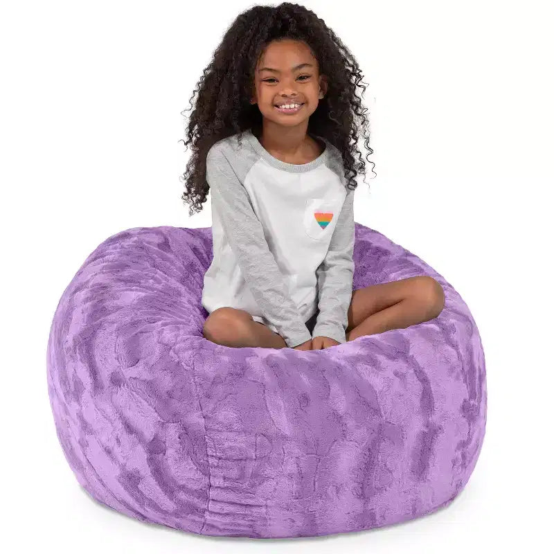 Pouf en fausse fourrure – Plusieurs coloris – 1 place