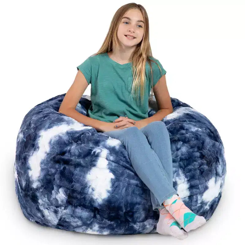 Pouf en fausse fourrure – Plusieurs coloris – 1 place