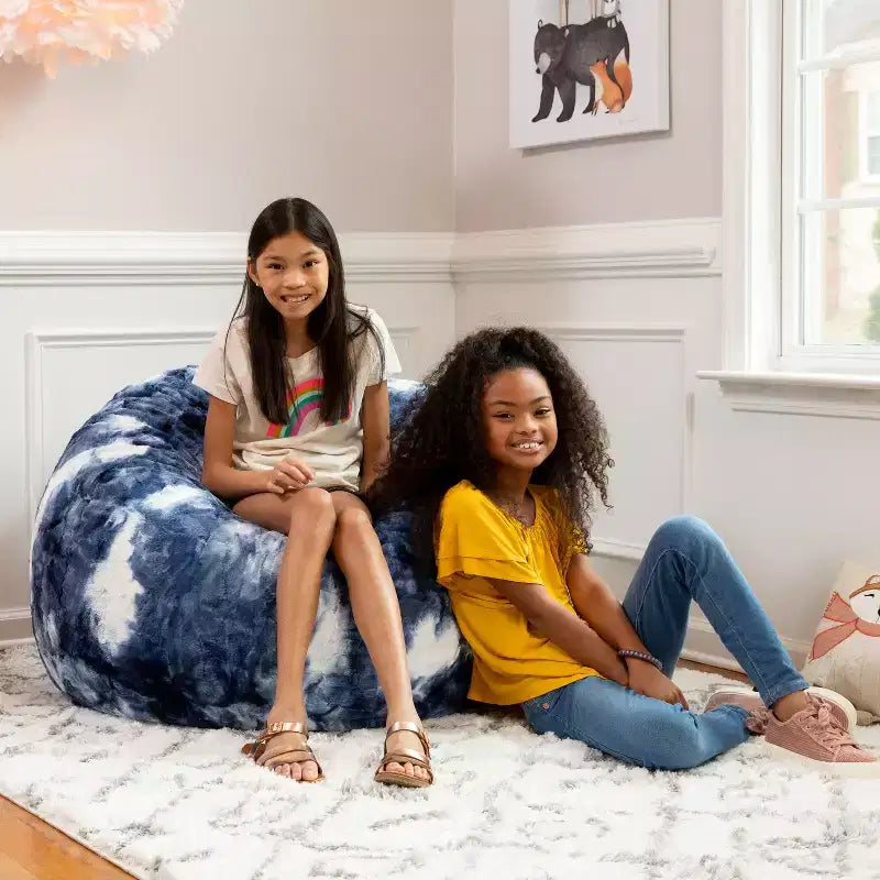 Pouf en fausse fourrure – Plusieurs coloris – 1 place