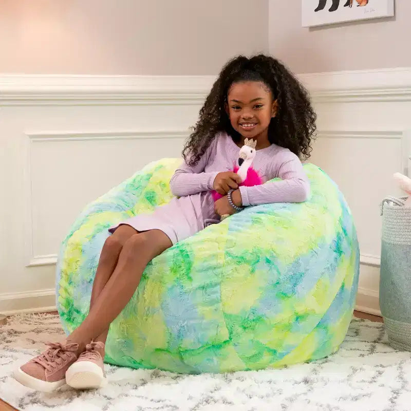 Pouf en fausse fourrure – Plusieurs coloris – 1 place