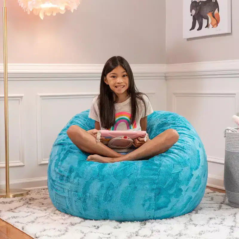 Pouf en fausse fourrure – Plusieurs coloris – 1 place