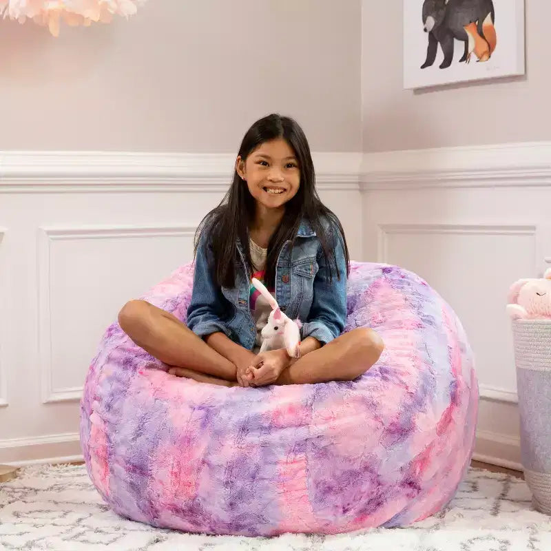 Pouf en fausse fourrure – Plusieurs coloris – 1 place