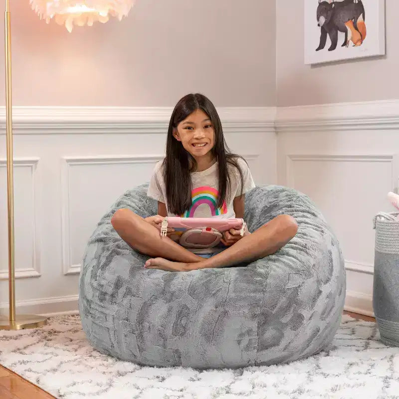 Pouf en fausse fourrure – Plusieurs coloris – 1 place