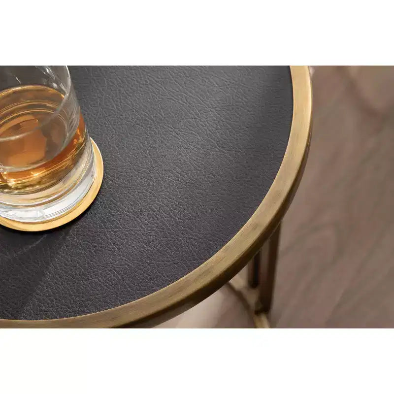Table d'appoint ronde noire et dorée, piétement métallique, simple